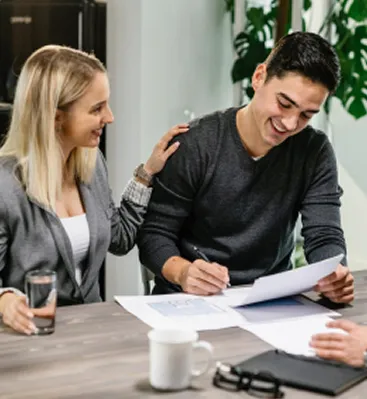 Insurance advisors meeting with clients